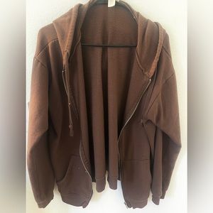 Tilly’s zip up sweater. Used but in good condition.